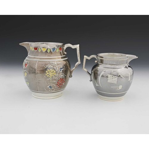 756 - Two English resist lustre jugs, circa 1820, one with enamelled coloured decoration (2)