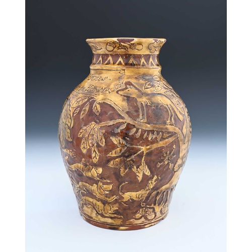 757 - An English slipware jug, sgraffito decorated in the West Country style with Ye Fox and Hounds, Phili... 