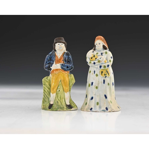 761 - A pair of miniature Staffordshire pearlware figures of a man and woman, circa 1810 (2)