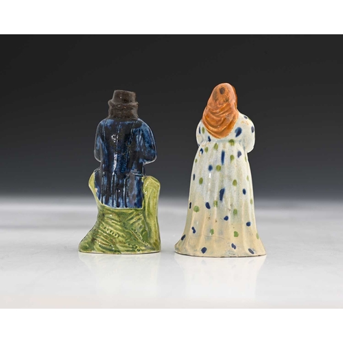 761 - A pair of miniature Staffordshire pearlware figures of a man and woman, circa 1810 (2)