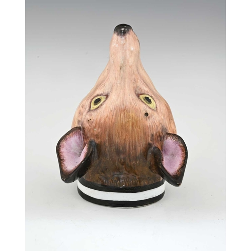 767 - A Staffordshire pearlware fox head stirrup cup, circa 1825