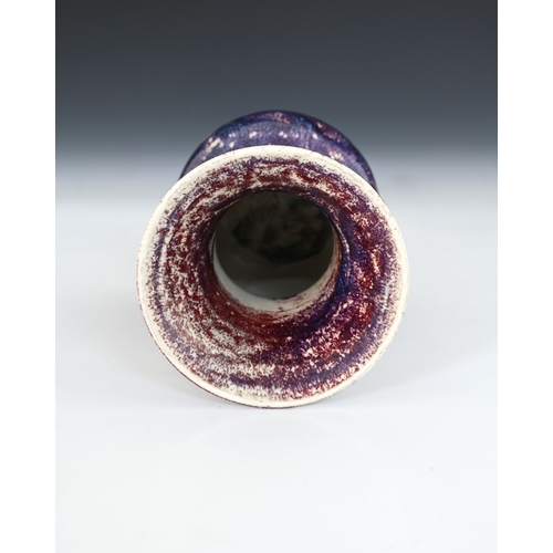 659 - Ruskin Pottery, a High Fired vase, 1920, conical bulbous form with flared trumpet neck, purple hares... 