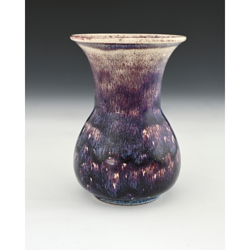 659 - Ruskin Pottery, a High Fired vase, 1920, conical bulbous form with flared trumpet neck, purple hares... 