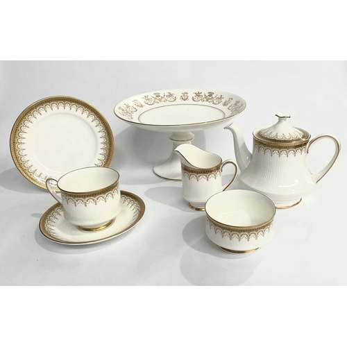 17 - A collection of gilded porcelain on a white ground, Paragon 'Athena' part tea service, Coalport 'All... 