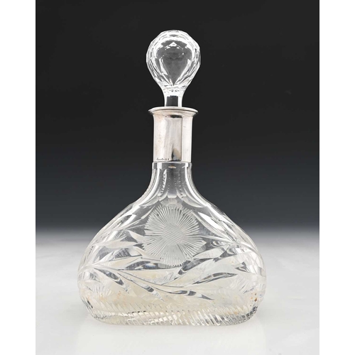 107 - An Elizabeth II silver-mounted decanter, with faceted bulbous glass body, the collar hallmarked 'B&B... 