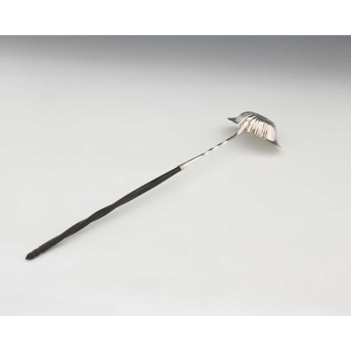 108 - France. A nineteenth-century French first-standard (.950) silver toddy ladle, with a fluted navette-... 