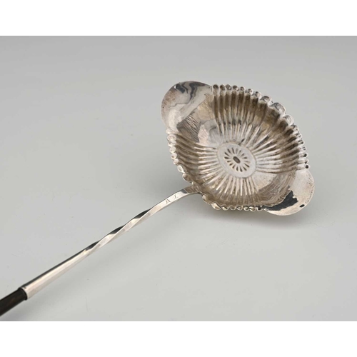 108 - France. A nineteenth-century French first-standard (.950) silver toddy ladle, with a fluted navette-... 