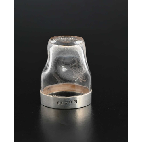 133 - Christopher Dresser, (Attributed). A Victorian silver mounted glass tot cup, the glass body with dim... 