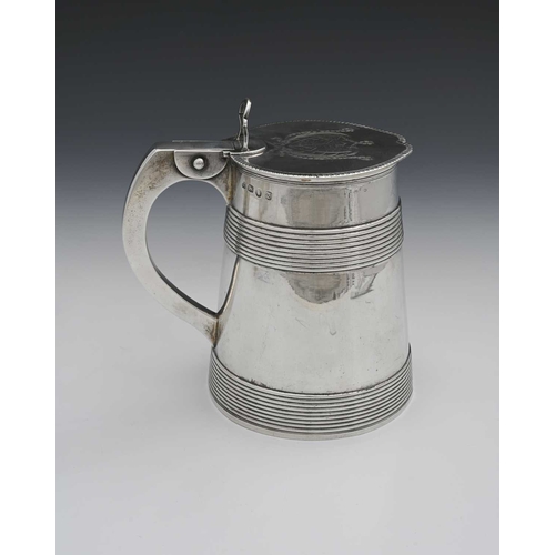 152 - An eighteenth-century George III silver tankard, of flared cylindrical form, the body with coopered ... 