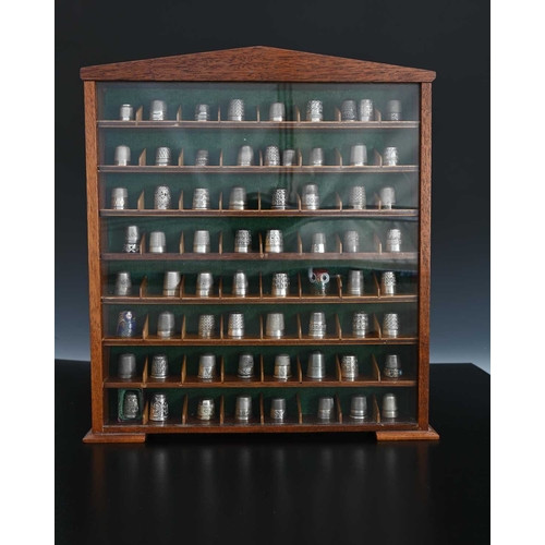 173 - A collection of sixty-seven thimbles, early twentieth-century and later, to include thirty-five silv... 