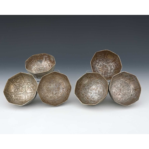 20 - A set of six silver-coloured metal octagonal bowls, likely of Eastern extraction, each decorated wit... 