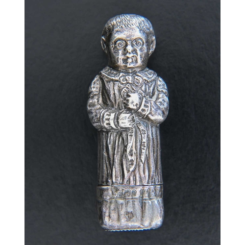 332 - A late Victorian silver novelty figural vesta case, modelled in the form of a baby or a child, the h... 