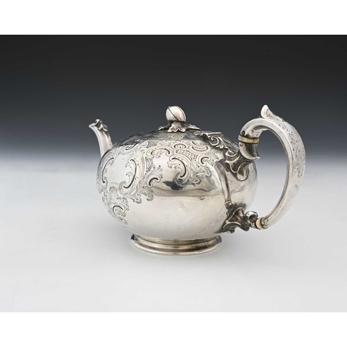 57 - A Victorian silver teapot, of globular form, the body decorated with trellis work, Rococo style scro... 