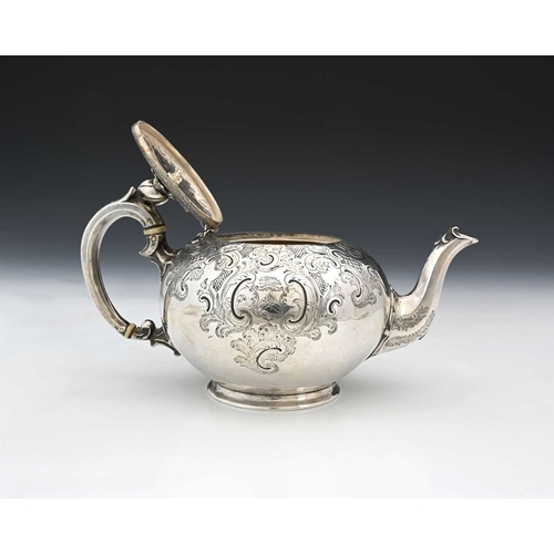 57 - A Victorian silver teapot, of globular form, the body decorated with trellis work, Rococo style scro... 