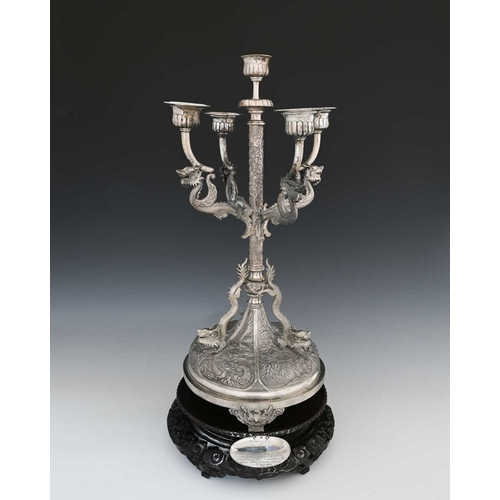 85 - China. A late nineteenth or early twentieth-century Chinese silver five-light candelabrum, the four ... 