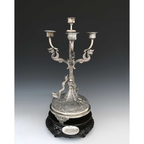 85 - China. A late nineteenth or early twentieth-century Chinese silver five-light candelabrum, the four ... 