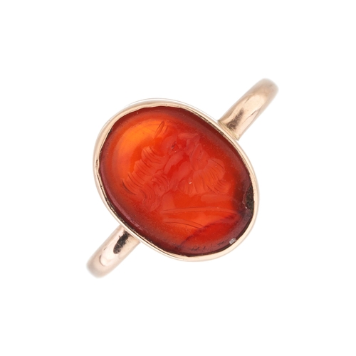 134 - A 19th century gold carnelian intaglio ring, possibly depicting Socrates in profile, ring size G, 2.... 