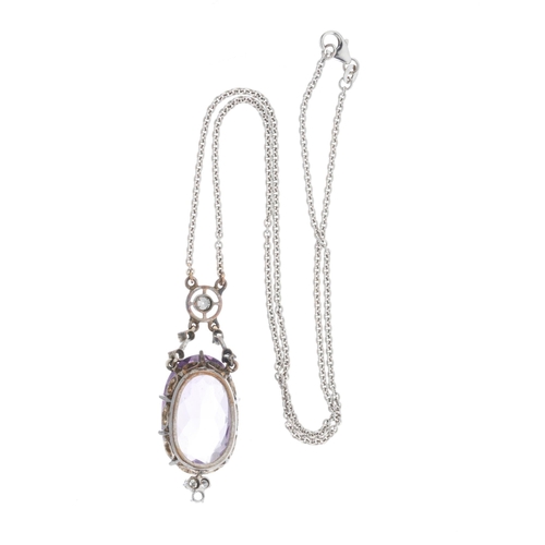 143 - An early 20th century 14ct gold amethyst and old-cut diamond pendant, suspended from a later 14ct go... 