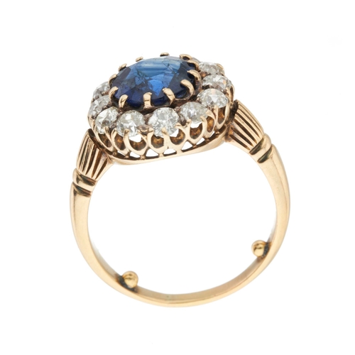 148 - A late Victorian gold cushion-shape sapphire and old-cut diamond cluster ring, with grooved shoulder... 