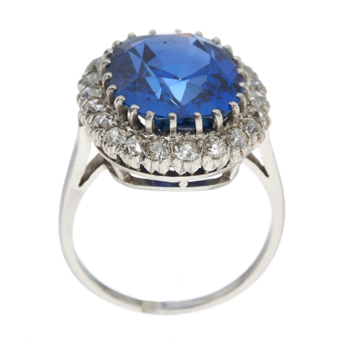 154 - An exceptional early 20th century platinum Sri Lankan cushion-shape sapphire and old-cut diamond clu... 