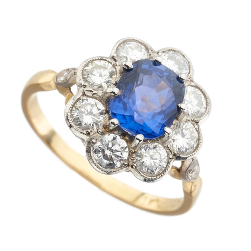 156 - An 18ct gold and platinum, cushion-shape sapphire and brilliant-cut diamond cluster ring, sapphire e... 