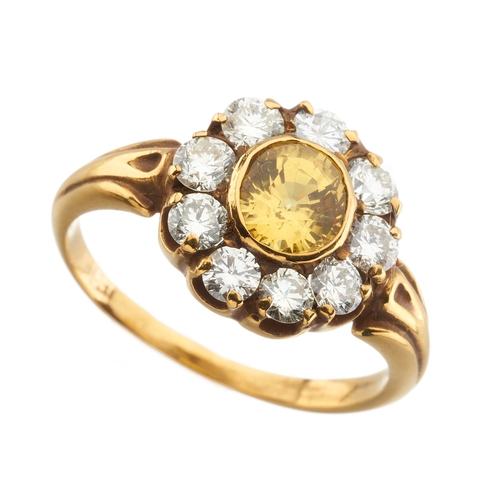 157 - An 18ct gold yellow sapphire and brilliant-cut diamond cluster ring, sapphire estimated weight 1.20c... 