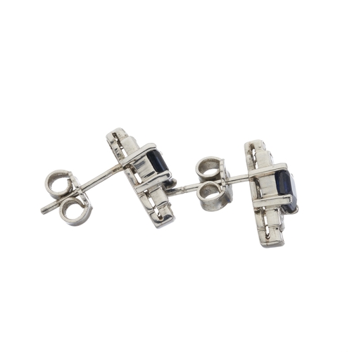 171 - A pair of sapphire and rectangular-shape diamond stud earrings, estimated total diamond weight 0.80c... 