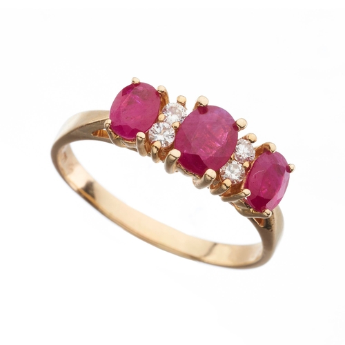 172 - A 14ct gold graduated oval-shape ruby three-stone dress ring, with brilliant-cut diamond double spac... 