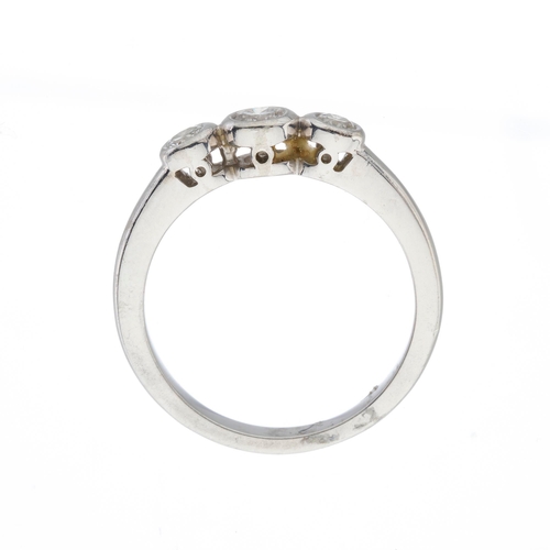 180 - An 18ct gold brilliant-cut diamond three-stone ring, estimated total diamond weight 0.35ct, H-I colo... 