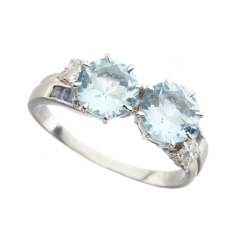 182 - An 18ct gold aquamarine two-stone dress ring, with brilliant-cut diamond and calibre-cut tanzanite s... 