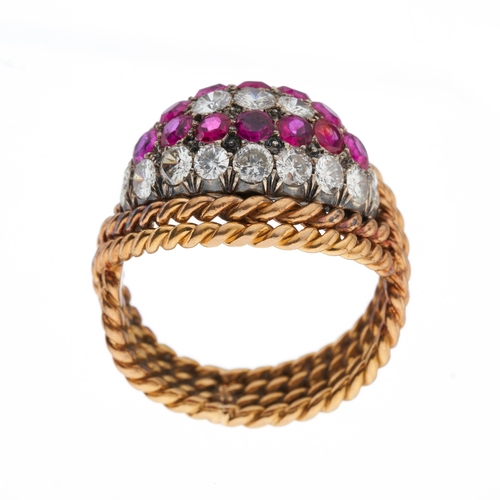 190 - A 1970s 18ct gold ruby and brilliant-cut diamond bombe ring, with rope-twist surround and band, esti... 