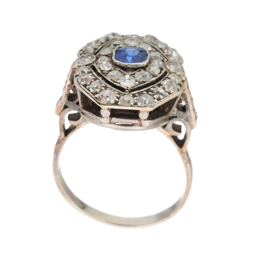 196 - An early 20th century cushion-shape sapphire and old-cut diamond cluster dress ring, estimated total... 