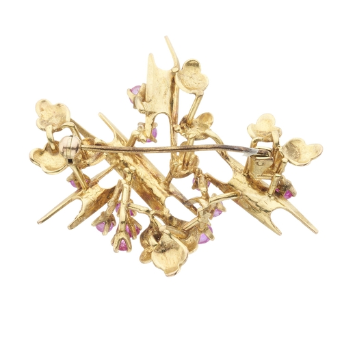 201 - An 18ct gold ruby accent foliate abstract brooch, length 4.8cm, 9.2g