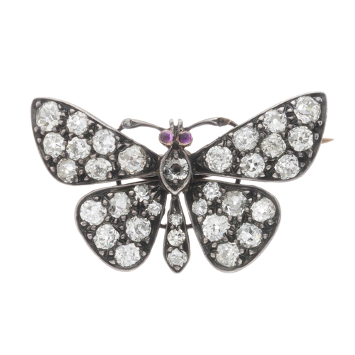 21 - A late Victorian old-cut diamond butterfly brooch, with pink sapphire cabochon eyes, estimated total... 