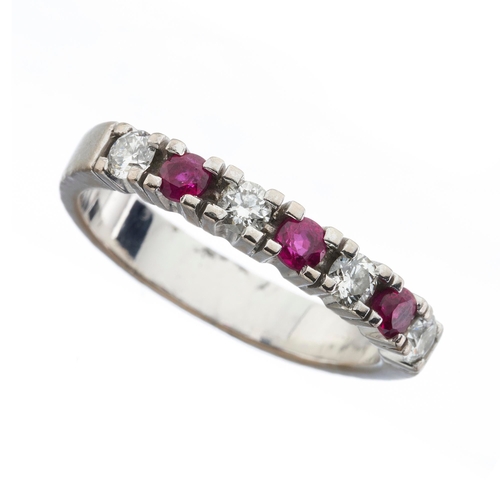 215 - An 18ct gold ruby and brilliant-cut diamond half eternity ring, estimated total diamond weight 0.25c... 