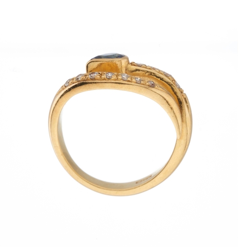 217 - An 18ct gold sapphire and single-cut diamond crossover dress ring, estimated total diamond weight 0.... 