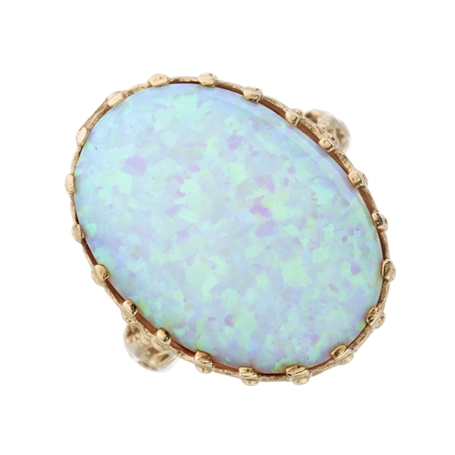 221 - A 9ct gold synthetic opal cabochon single-stone ring, hallmarks for Birmingham, ring size O, 10.4g