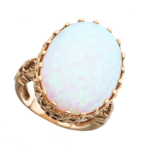 221 - A 9ct gold synthetic opal cabochon single-stone ring, hallmarks for Birmingham, ring size O, 10.4g