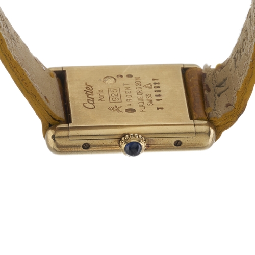 226 - Cartier, a silver-gilt Must De Cartier Tank wrist watch, case number 3 149927, French convention mar... 