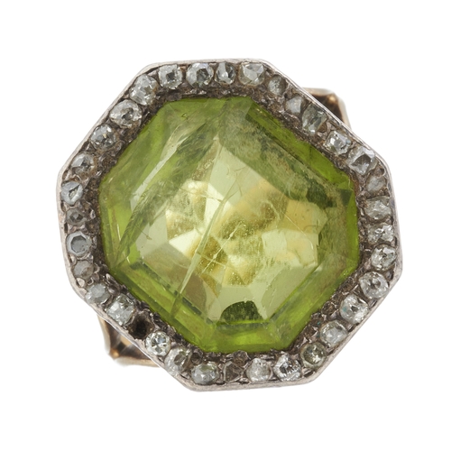 25 - A late 19th century 18ct gold octagonal-shape peridot and old-cut diamond cluster ring, peridot esti... 