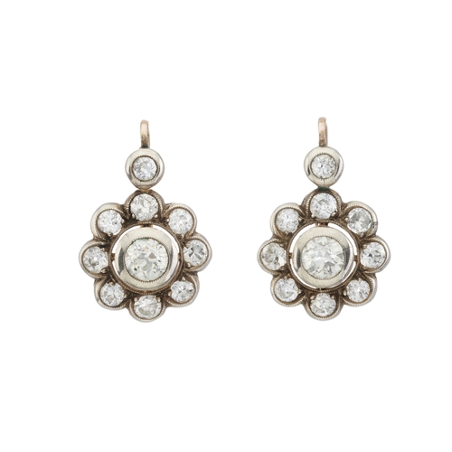 26 - A pair of late 19th century gold and silver, old-cut diamond cluster earrings, with similarly-cut di... 