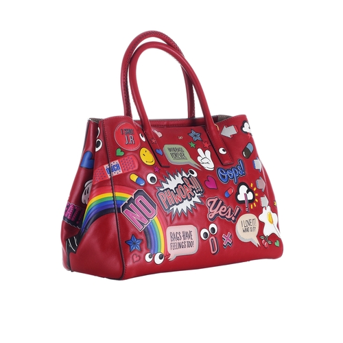 283 - Anya Hindmarch, an Ebury All Over Sticker handbag, crafted from red leather featuring colourful fun ... 