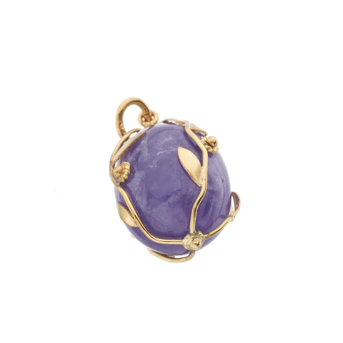 29 - An amethyst egg charm pendant, encased in an 18ct gold foliate wire mount, stamped 750, length 2.9cm... 