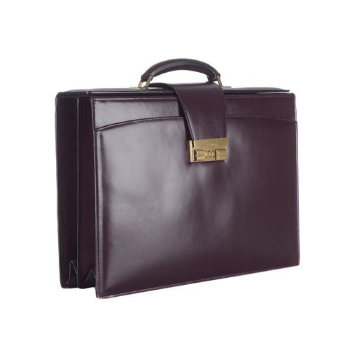 291 - Bally, a Bordeaux leather briefcase, crafted from smooth burgundy leather, with brushed gold-tone ha... 