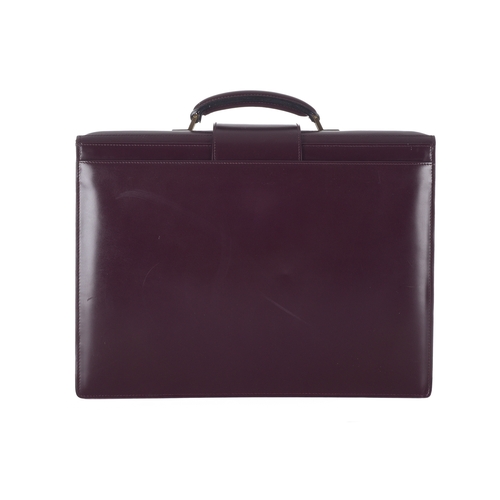 291 - Bally, a Bordeaux leather briefcase, crafted from smooth burgundy leather, with brushed gold-tone ha... 