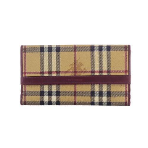 295 - Burberry, a Haymarket Check wallet, crafted from beige check coated canvas with smooth burgundy leat... 