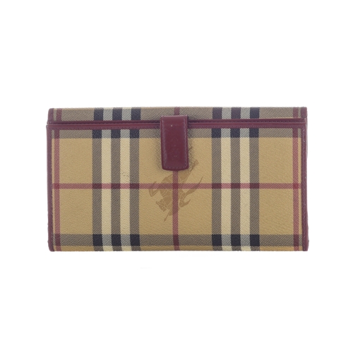 295 - Burberry, a Haymarket Check wallet, crafted from beige check coated canvas with smooth burgundy leat... 