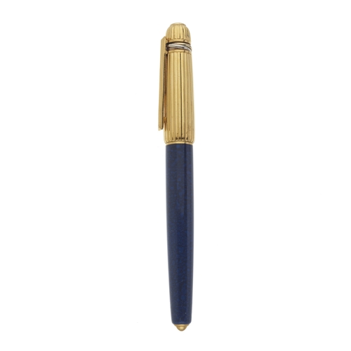 310 - Cartier, a Pasha De Cartier Trinity ballpoint pen, featuring a blue lapis patterned lacquer with rib... 