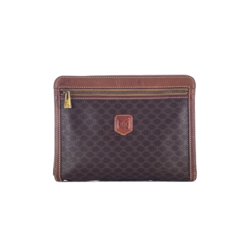 311 - Celine, a vintage macadam wristlet clutch, featuring the maker's brown monogram coated canvas exteri... 