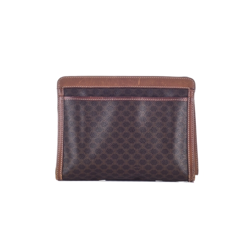 311 - Celine, a vintage macadam wristlet clutch, featuring the maker's brown monogram coated canvas exteri... 